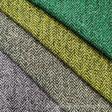 Woolen boucle herringbone with lurex fabric